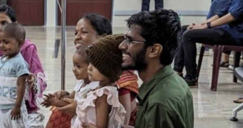 Families and volunteers enjoying an event together