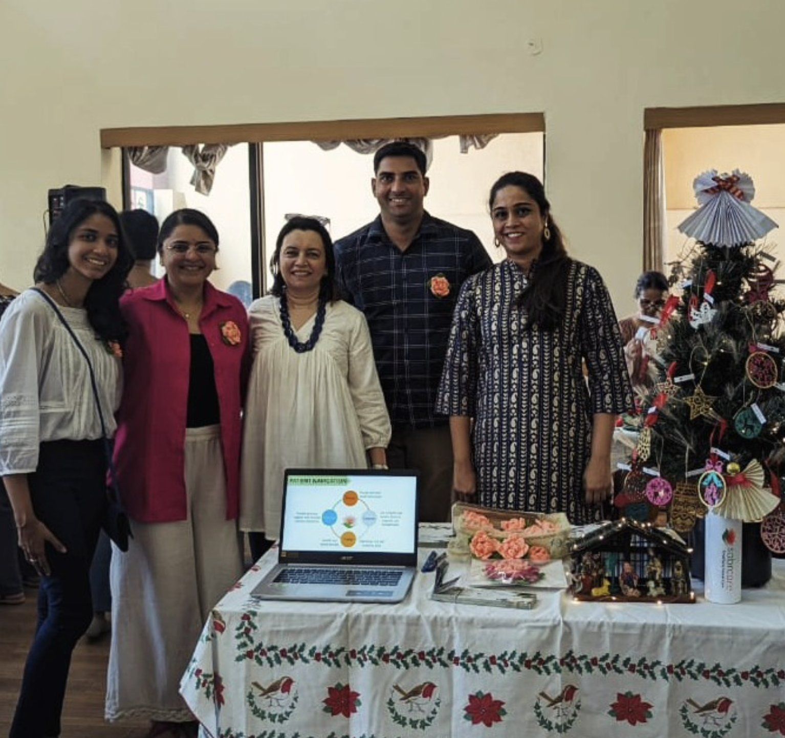 The Sabrcare team at a community fundraising stall